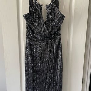 Robe longue avec mini jupe à l’intérieur paillettes argent et noir